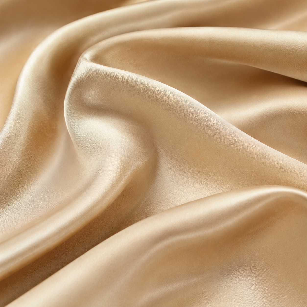 Close view of flowing champagne silk folds
